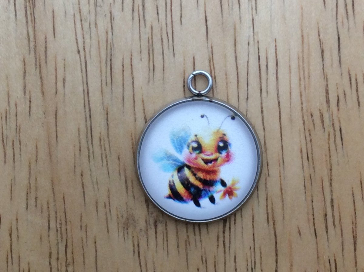 glass cabochon charm with a cute bumble bee image