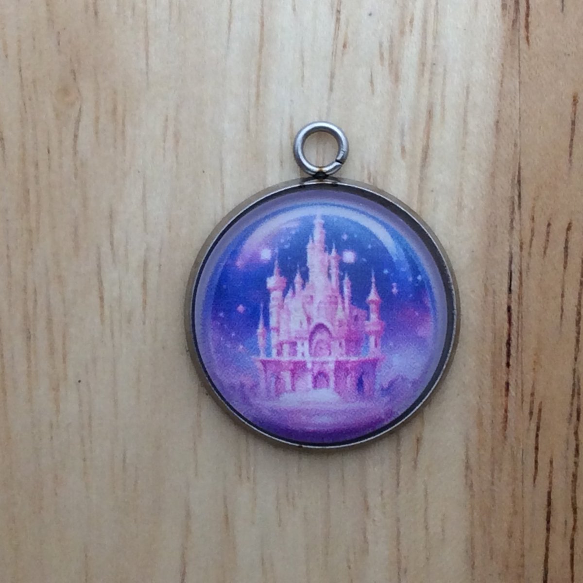 glass cabochon charm with a colorful fairytale castle