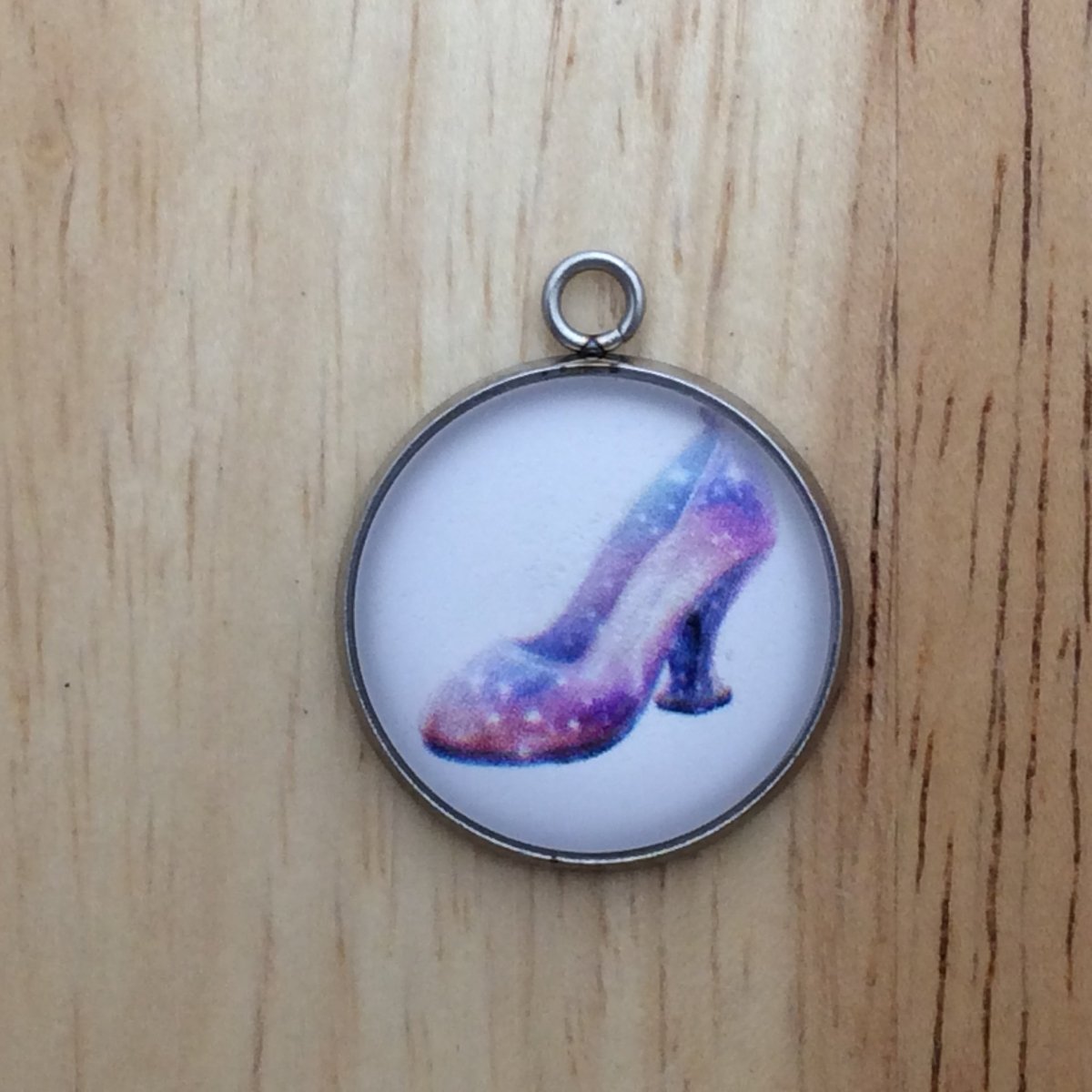 glass cabochon charm with a colorful fairytale princess shoe