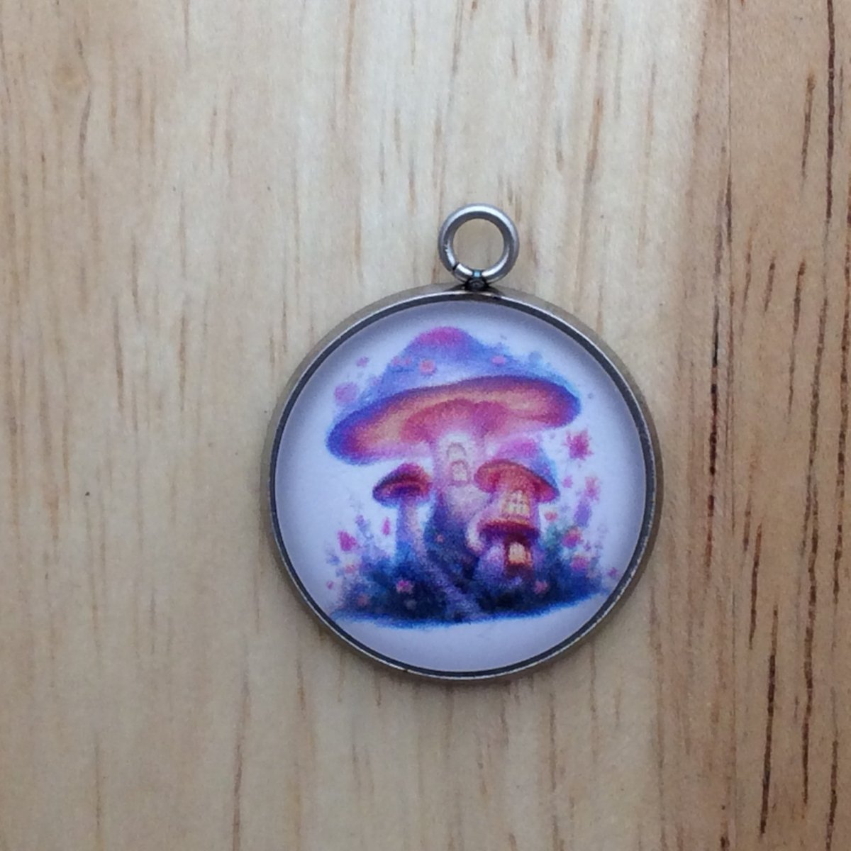 glass cabochon charm with a colorful fairytale mushrooms