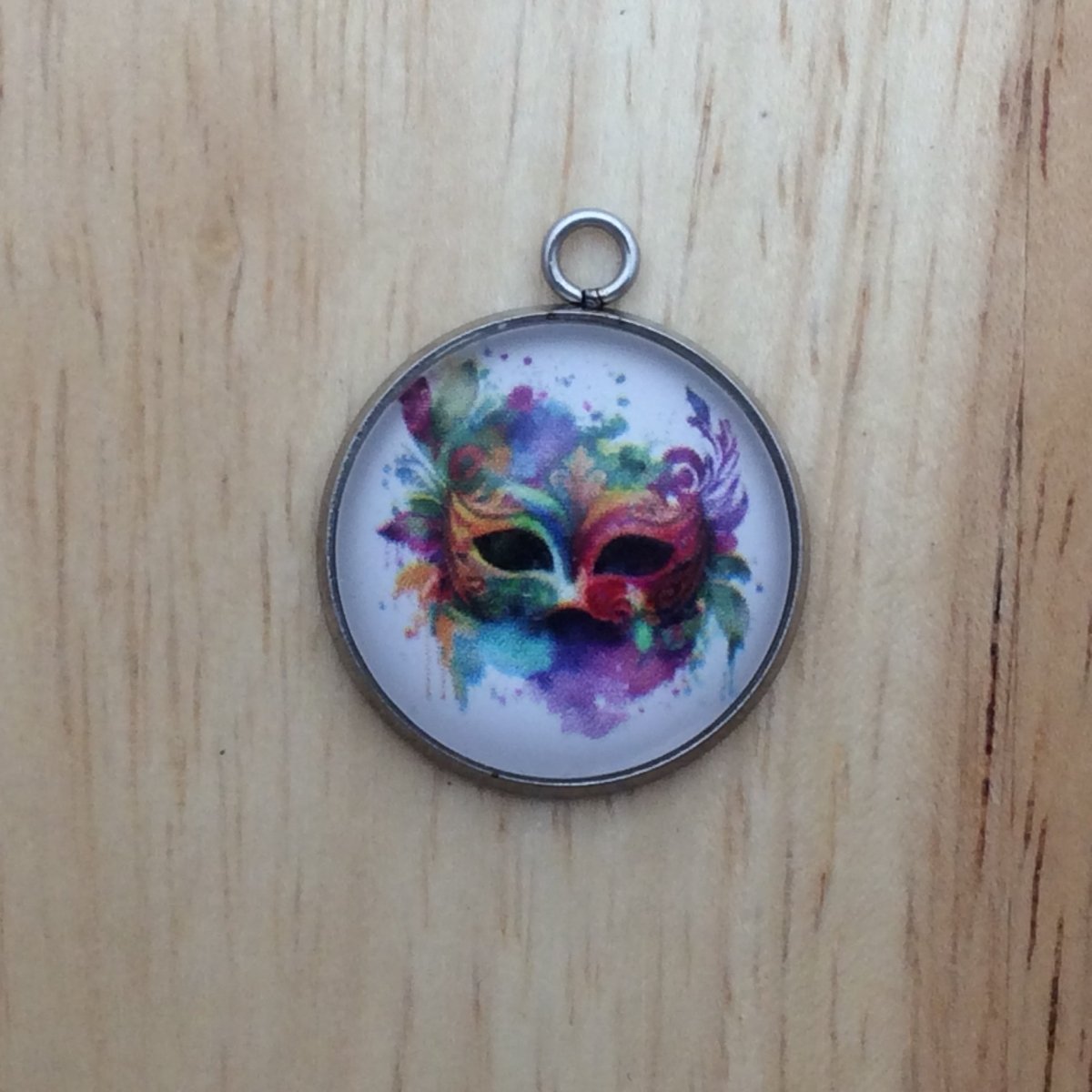 Colorful Mardi gras mask glass cabochon charmColorful Mardi gras mask glass cabochon charm