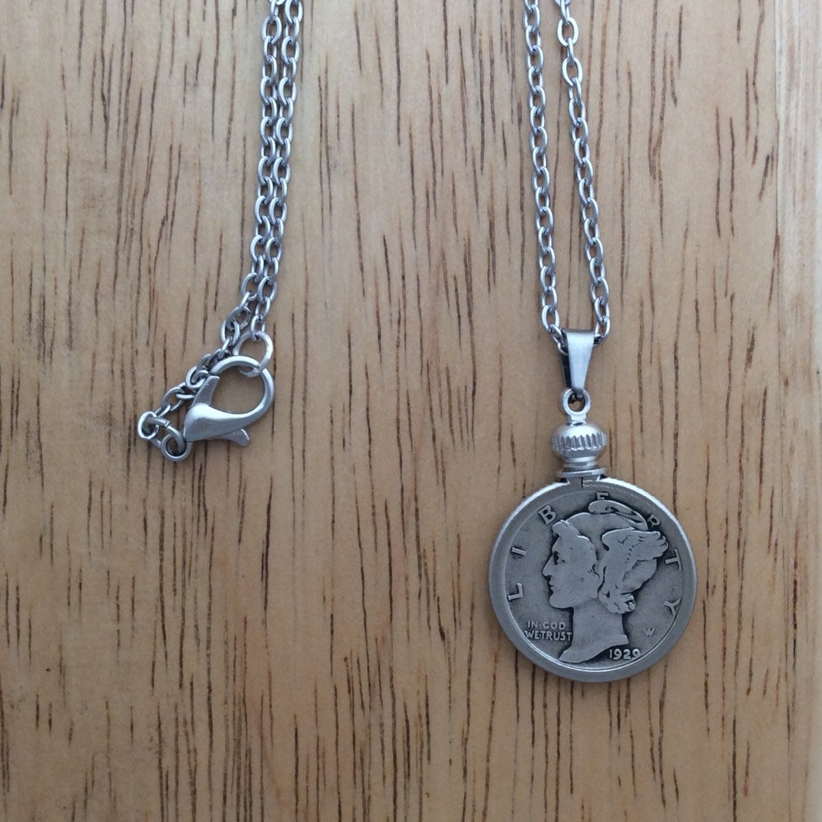 stainless steel necklace with a 1929 Mercury Dime pendant