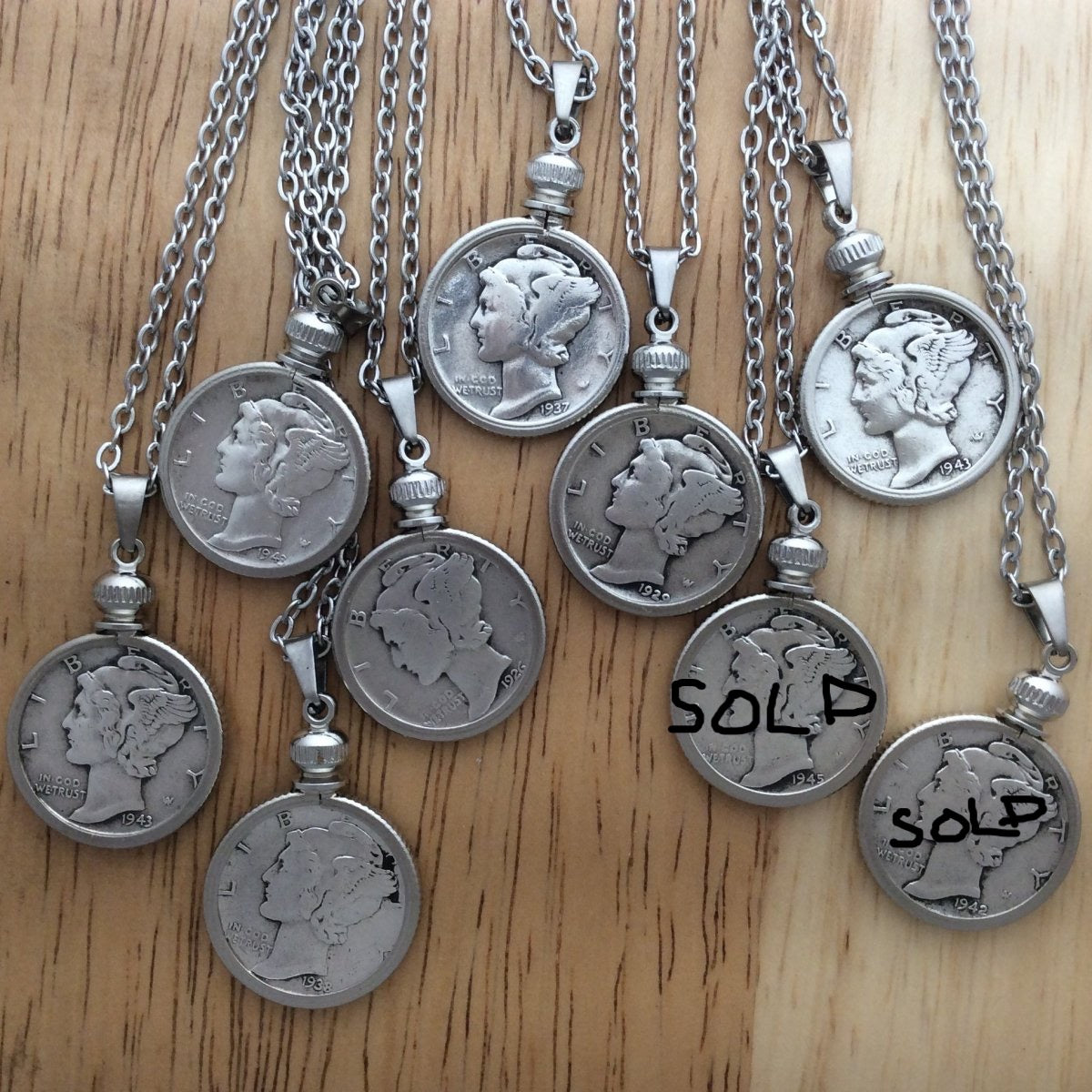 9 stainless steel necklaces with Mercury Dime pendants