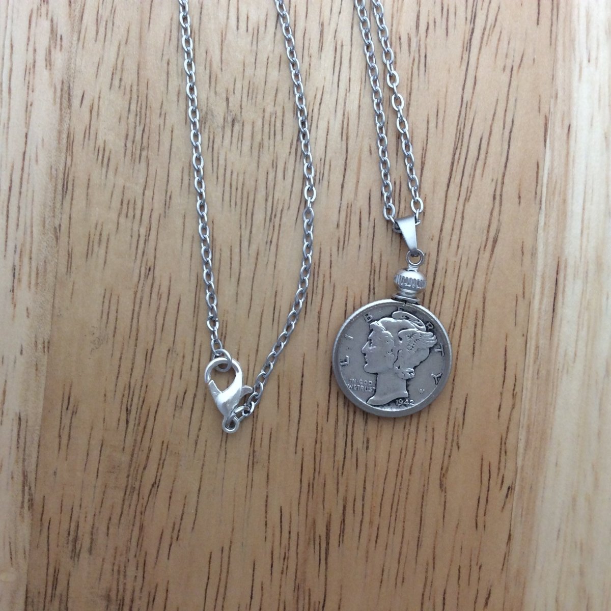 stainless steel necklace with a 1942 Mercury Dime pendant