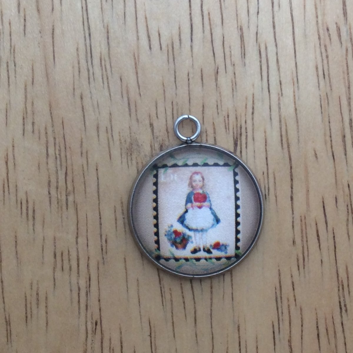  glass cabochon charm with picture of a vintage valentine stamp