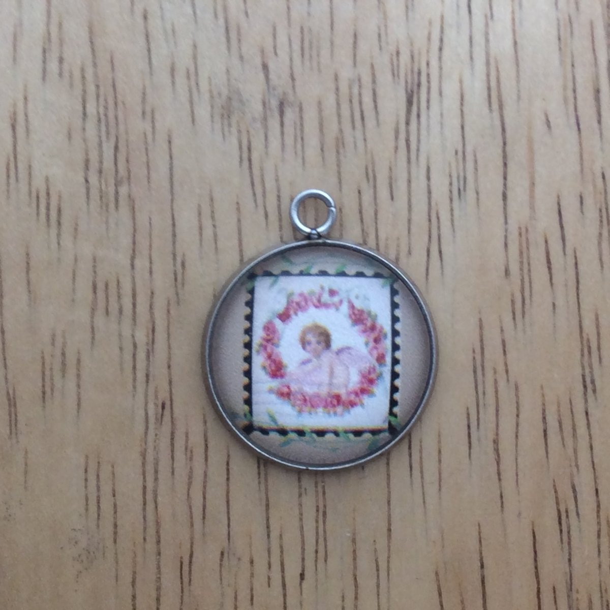  glass cabochon charm with picture of a vintage valentine stamp