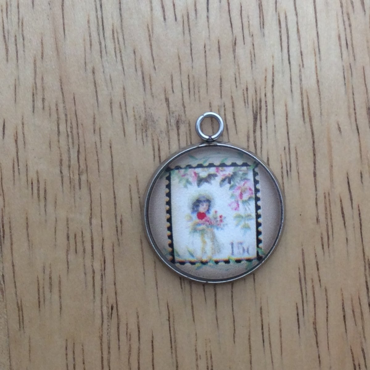  glass cabochon charm with picture of a vintage valentine stamp