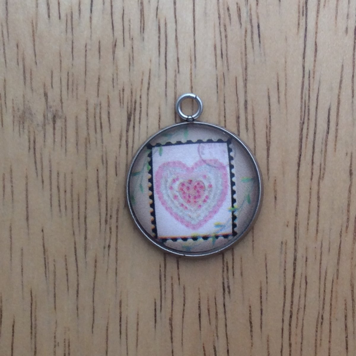  glass cabochon charm with picture of a vintage valentine stamp