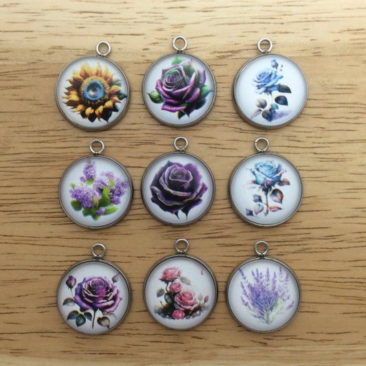 9 glass cabochon charms with images of pretty flowers