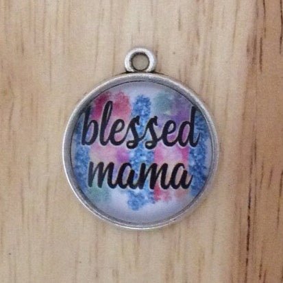 glass cabochon charm that says blessed mama