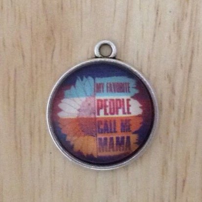 glass cabochon charm with a multicolored sunflower that says my favorite people call me momma