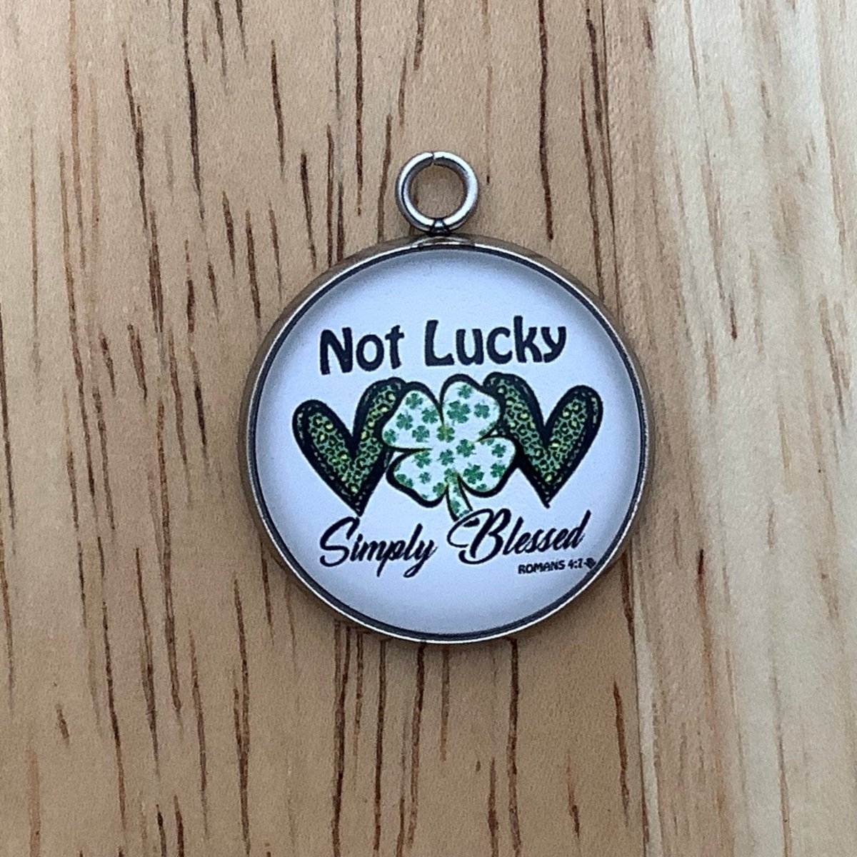 graphics of a heart, shamrock, heart.  with the words 'not lucky, simply blessed