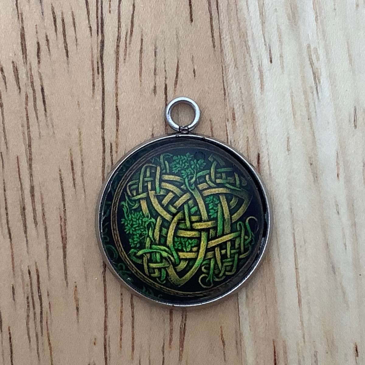 a celtic knot with vines