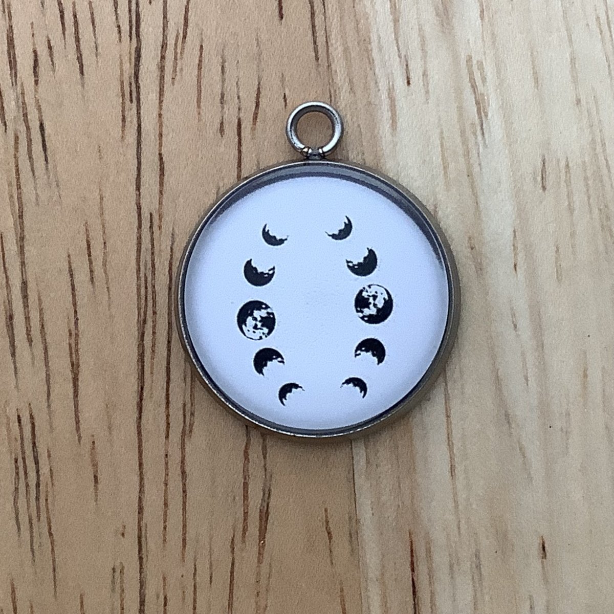 Charm featuring moon phases