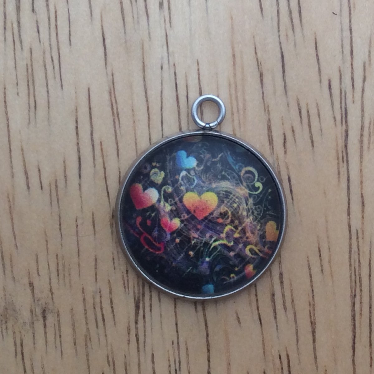 glass cabochon charm with Colorful hearts and musical notes