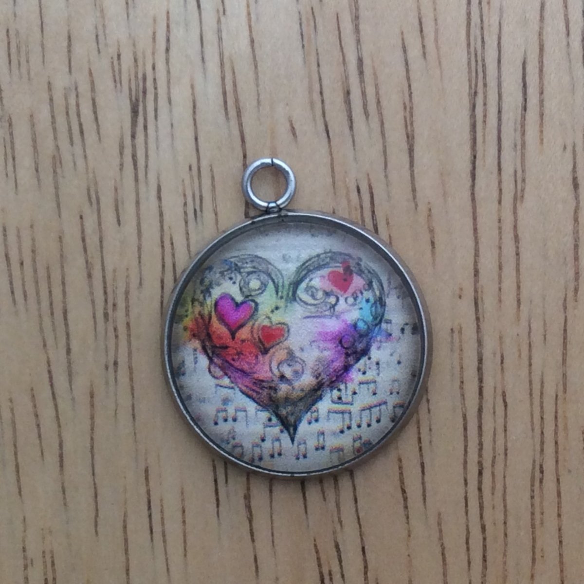 glass cabochon charm with Colorful hearts and musical notes