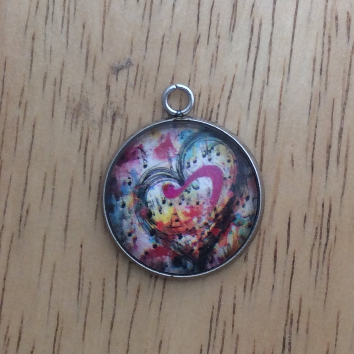 glass cabochon charm with Colorful hearts and musical notes