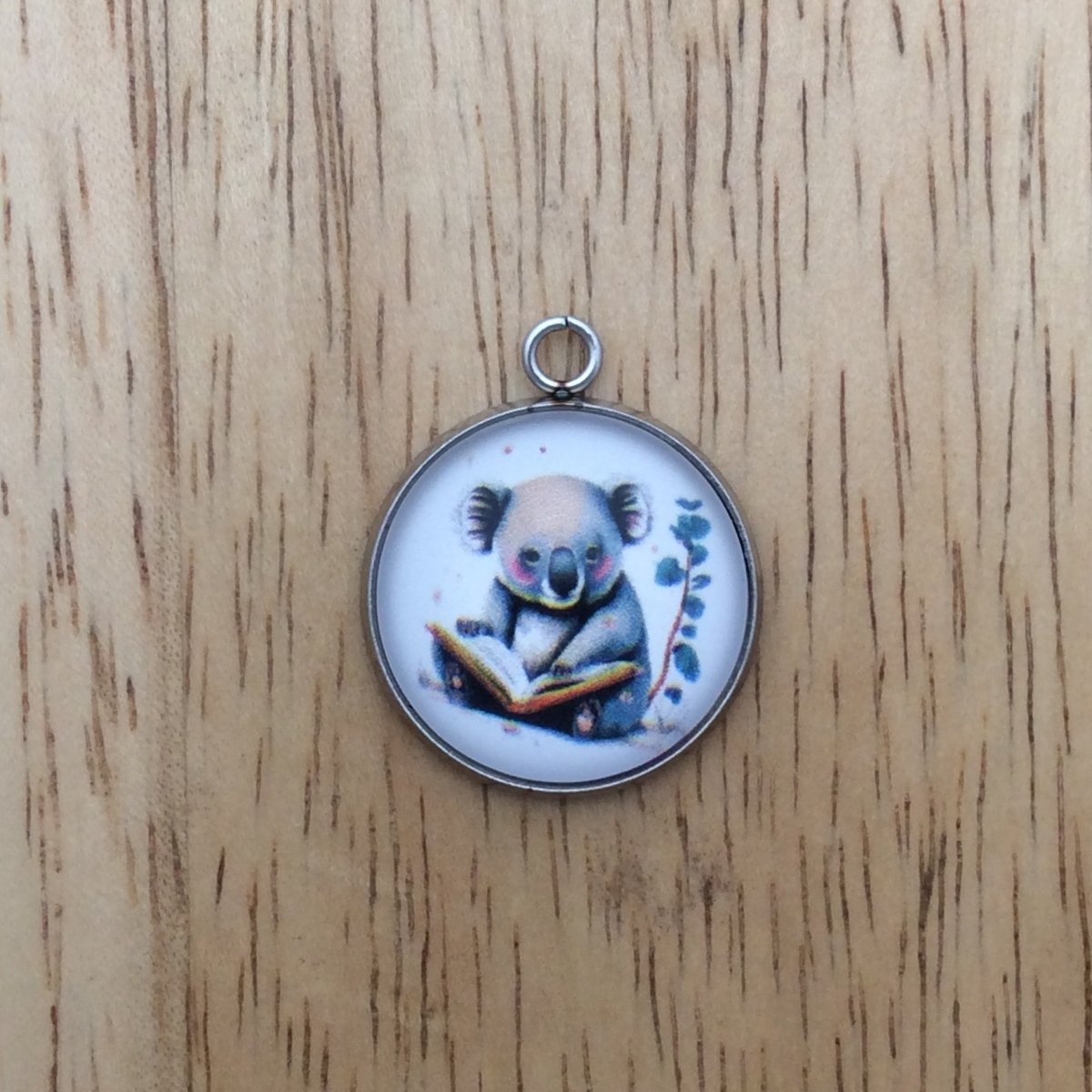 Koala Bear  reading a book glass cabochon charm