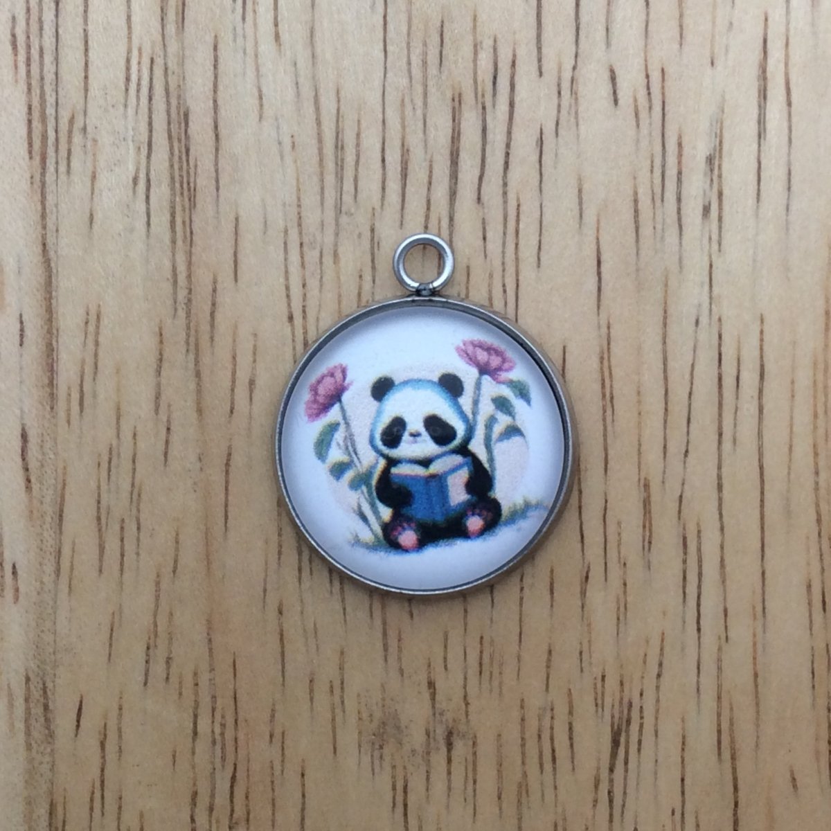 panda  reading a book glass cabochon charm