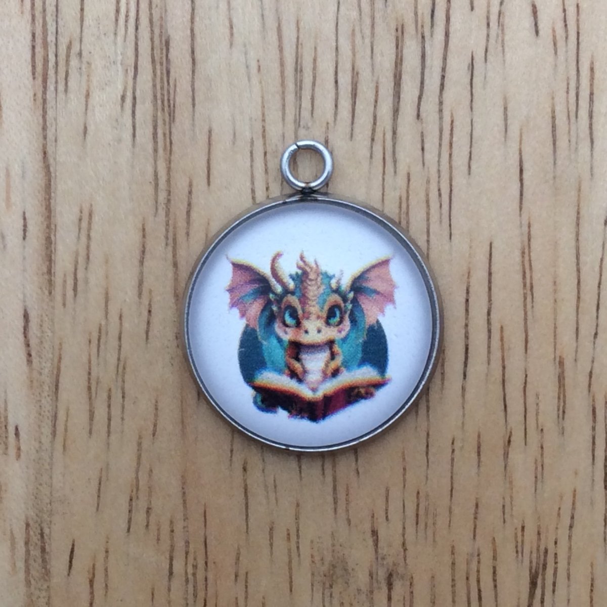 dragon reading a book glass cabochon charm