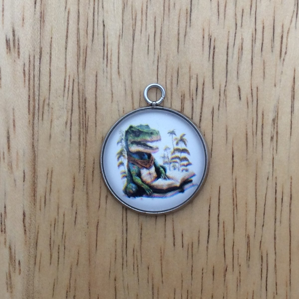 T-Rex  reading a book glass cabochon charm