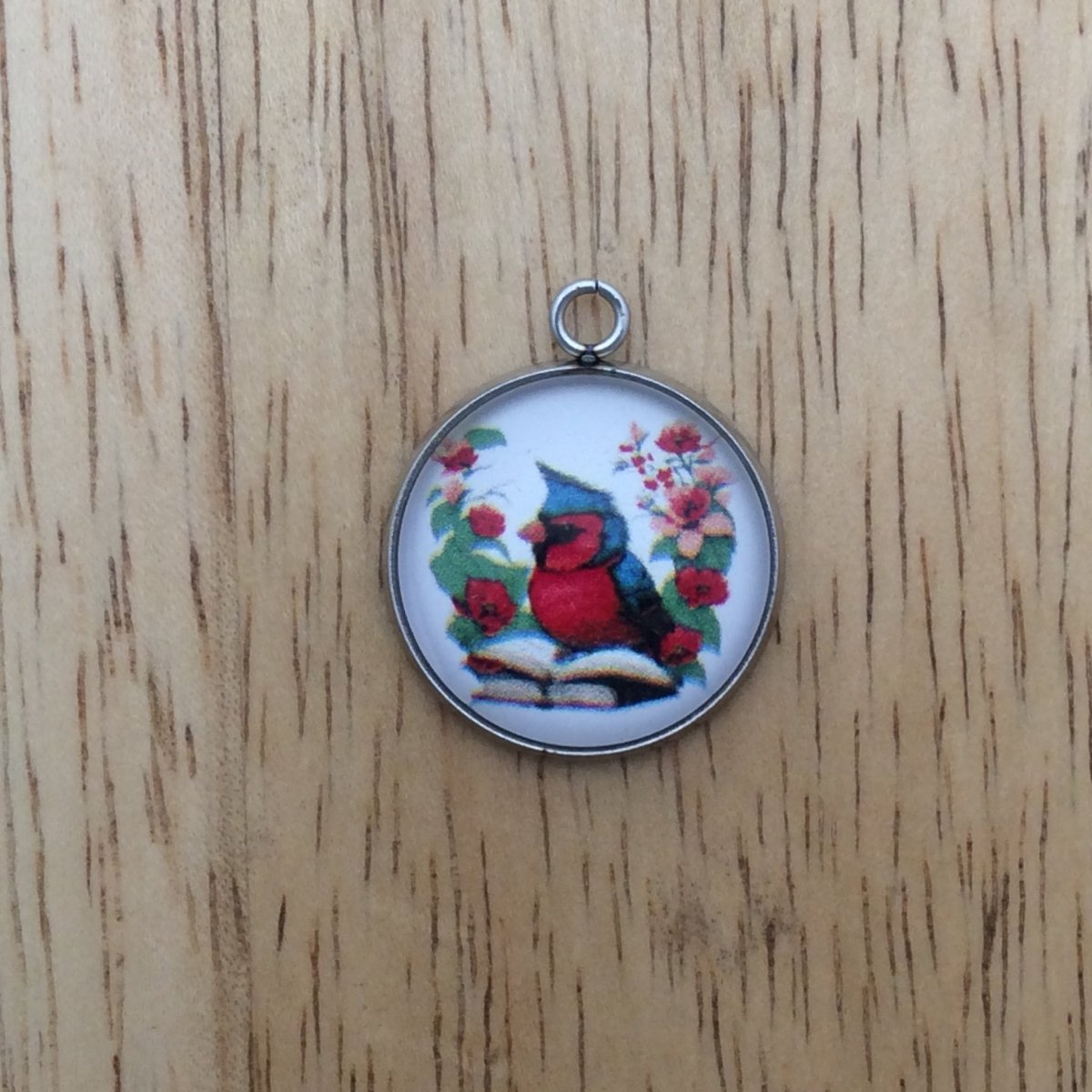 Cardinal  reading a book glass cabochon charm