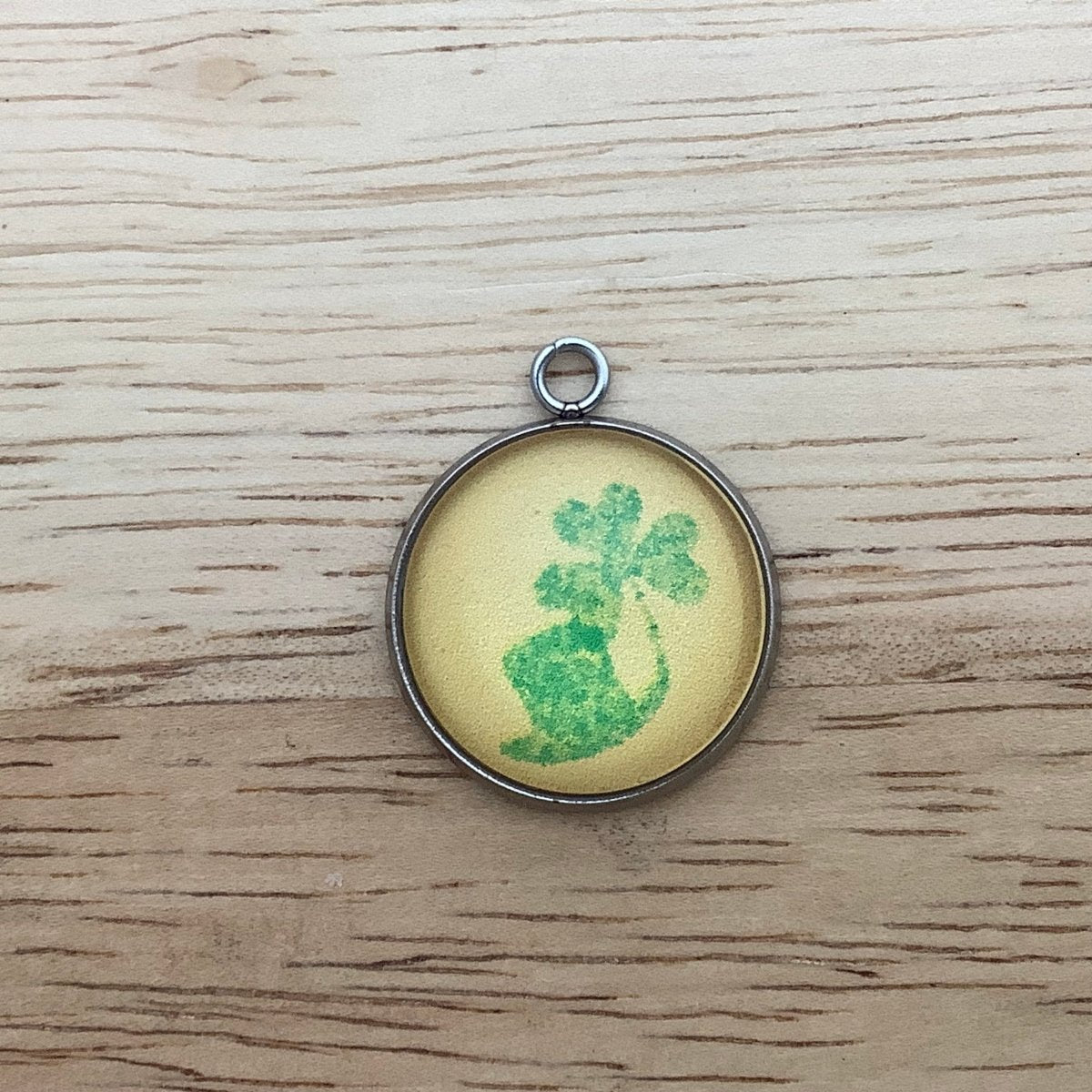 a green tophat and shamrock on a yellow background